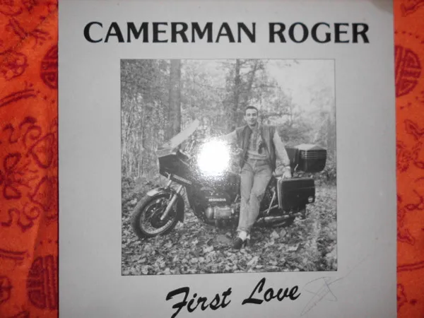 Camerman Roger — First Love, cover art